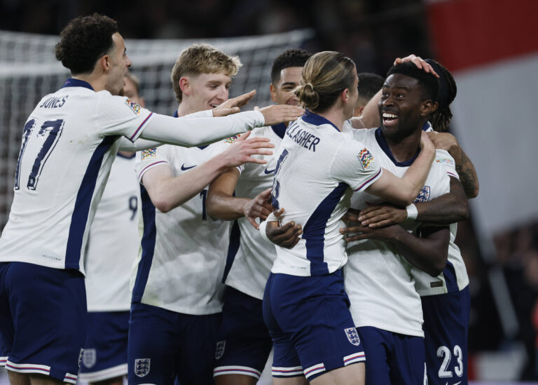 England midfielder curtis jones celebrates with teammates