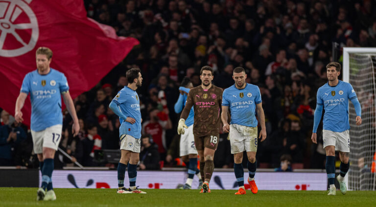 Manchester City players after a loss to Arsenal