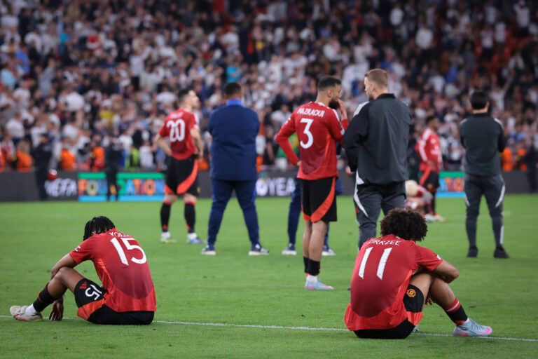 Leny Yoro and Joshua Zirkzee of Manchester United, ManU FC react following the final whistle of the Tottenham Hotspur vs Manchester United UEFA Europa League Final
