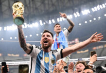 2026 world cup lionel messi holds trophy